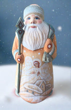 Load image into Gallery viewer, carved russian santa- beige colored with angel