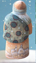 Load image into Gallery viewer, carved russian santa- beige colored with angel