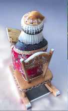 Load image into Gallery viewer, carved russian santa- santa in rocking chair reading a book