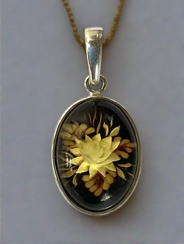 Hand Carved Floral Baltic Amber Pendant Set In Sterling Silver