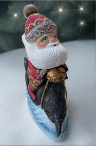 Hand Carved Carved Russian Santa On Penguin