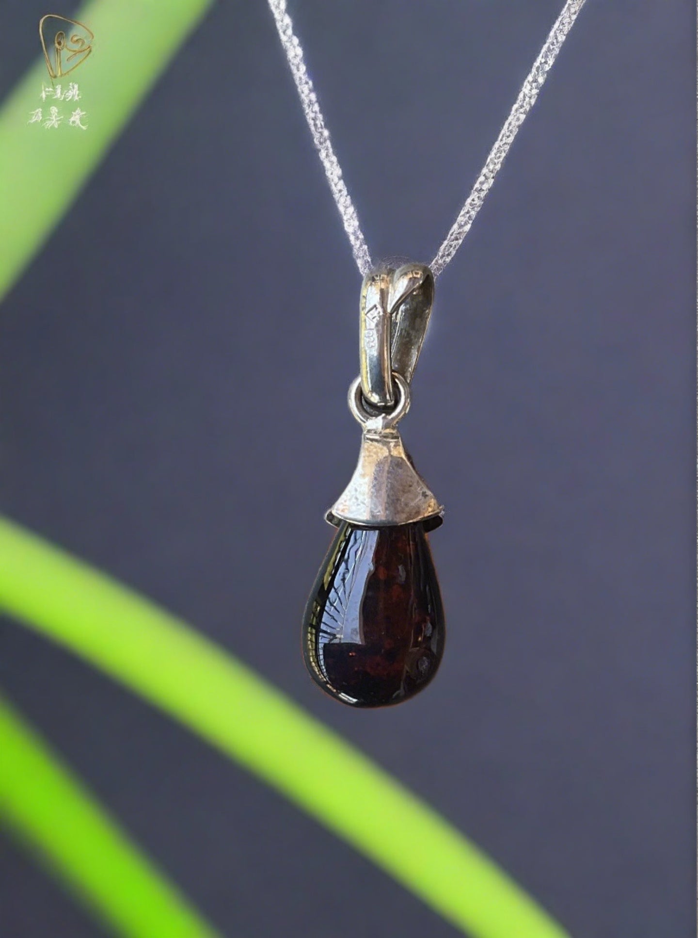 Hand Crafted Pear Shaped Cherry Amber Pendant