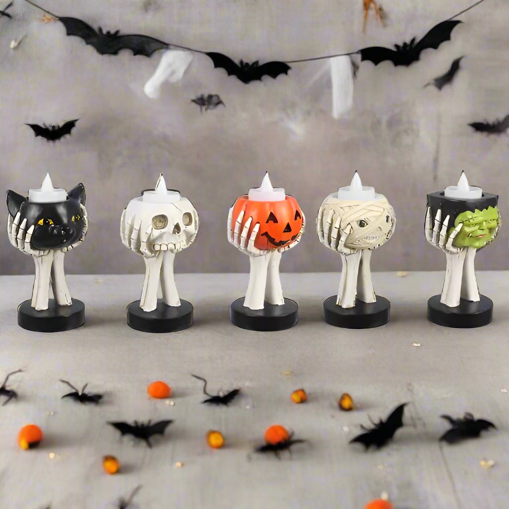 Youngs Inc. RESIN HALLOWEEN SKULL HANDS TEALIGHT HOLDER WITH COLOR TEALIGHT INCLUDED