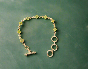 Princess Cut Peridot Toggle Clasp Bracelet Set In Sterling Silver