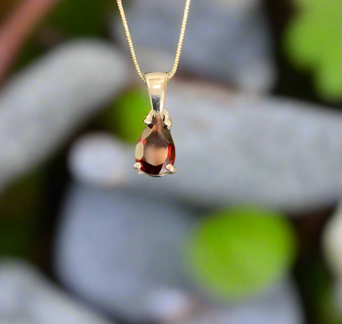 Hand Crafted Garnet Pendant Set In Sterling Silver