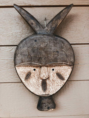 african masks round wood face