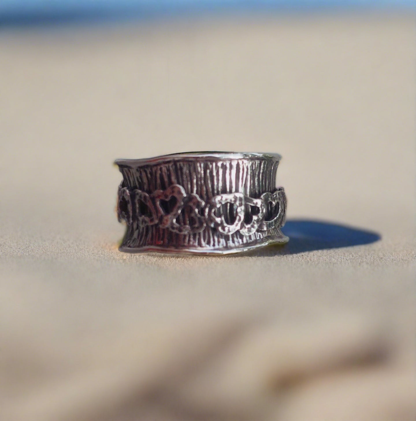 sd designs sterling silver spinner ring with hearts