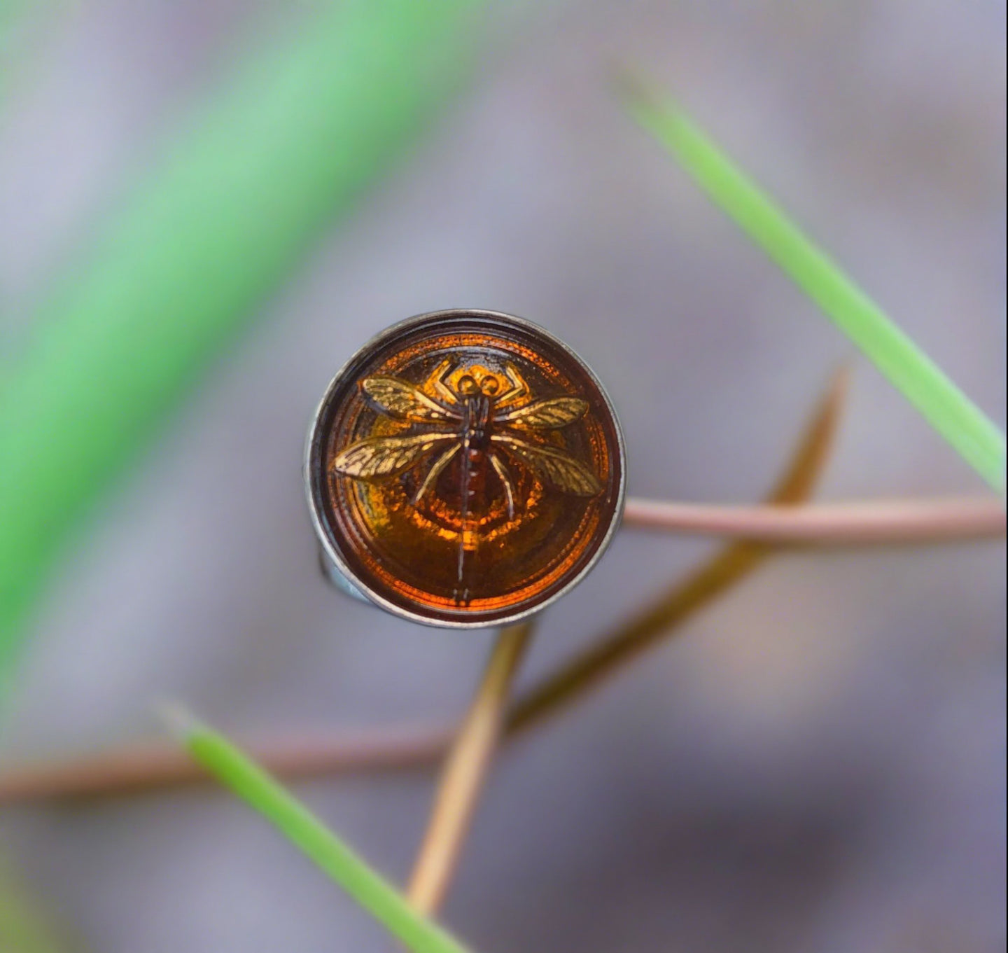 antique button ring, amber colored glass with dragonfly