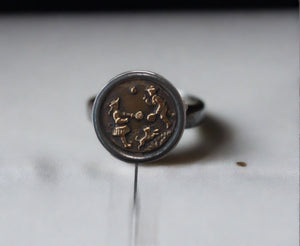 antique button ring, boy and girl playing tennis