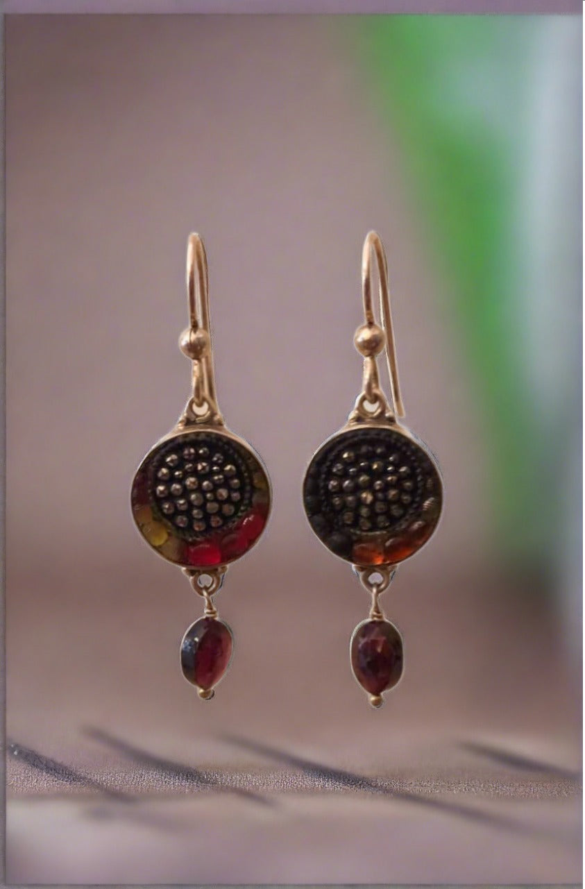 antique button earrings, amber tones with garnet drops