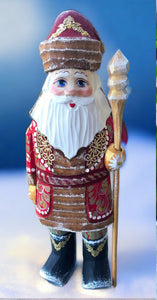 carved russian santa- red and gold coat with striped pants