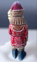 Load image into Gallery viewer, carved russian santa- red and gold coat with striped pants
