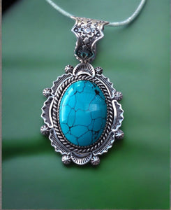 hand crafted turquoise and sterling silver pendant signed harold j