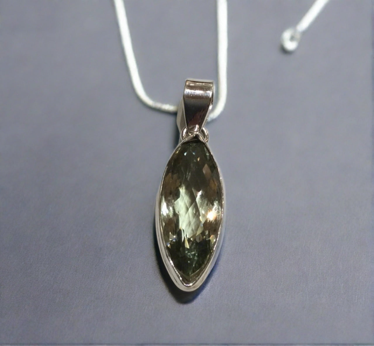 green amethyst marques shaped pendant in sterling silver