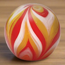 dynasty gallery small paperweight- feather yellow & orange glow
