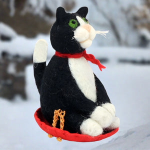 dzi handmade felted ornament: sledding kitty