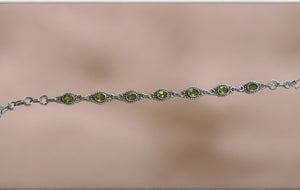 sterling silver bali style oval peridot bracelet